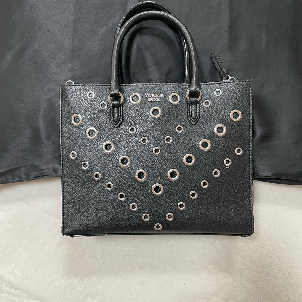 Victoria’s Secret black w silver hardware wrist/shoulder bag.